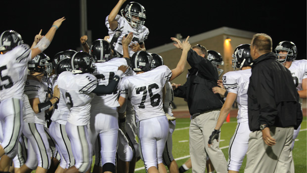 The team celebrates Brett Kosters game winning 16-yard field goal. 