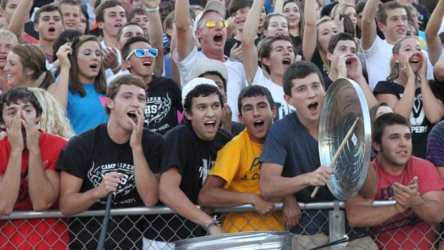 Fans cheer on the team at the Boerne game. 