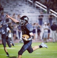 QB Jamie Hudson celebrates a touch down at the Vandegrift vs. McNeil game