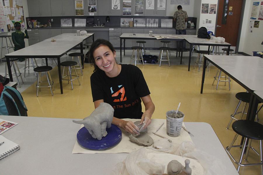 Ceramics students craft totems representing themselves