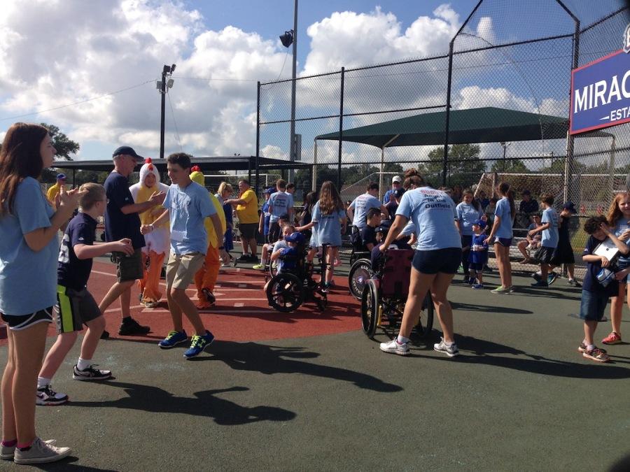 Students volunteering at Miracle League 