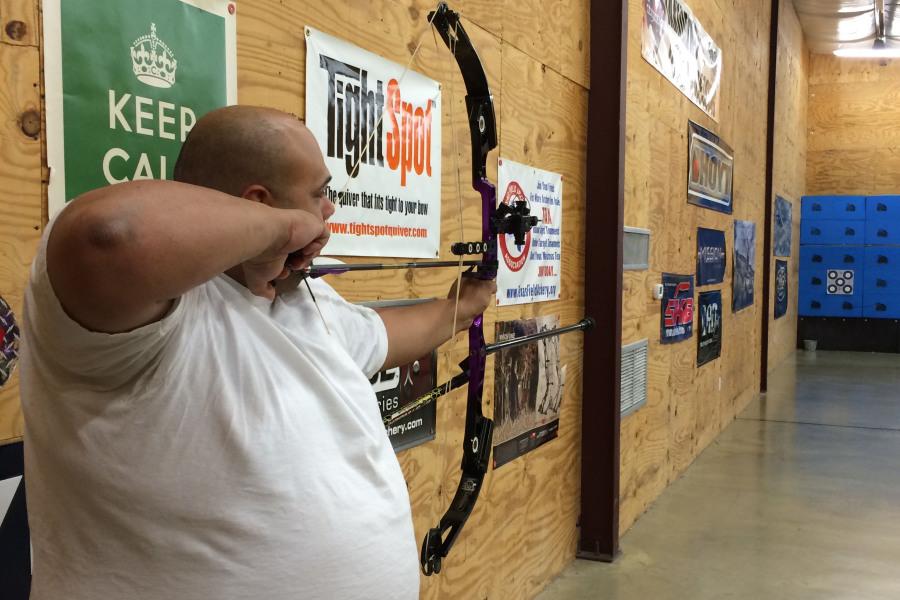 Roland Rocha prepares to shoot from his compound bow.