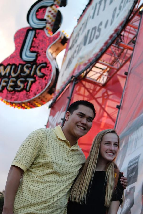 Contest winners pose in front of ACL's entrance after their VIP tour. 