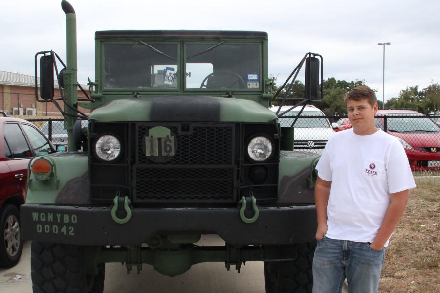 Junior Ethan Atencio next to his truck