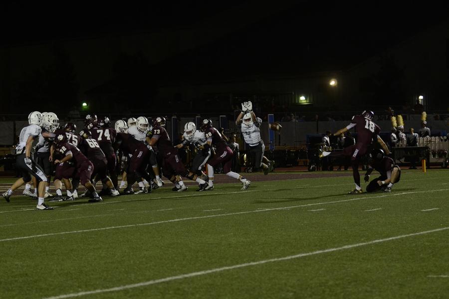 Junior defensive back Daniel Conte leaps to block the extra point against Dripping Springs. Vipers beat Dripping Springs 48-29.