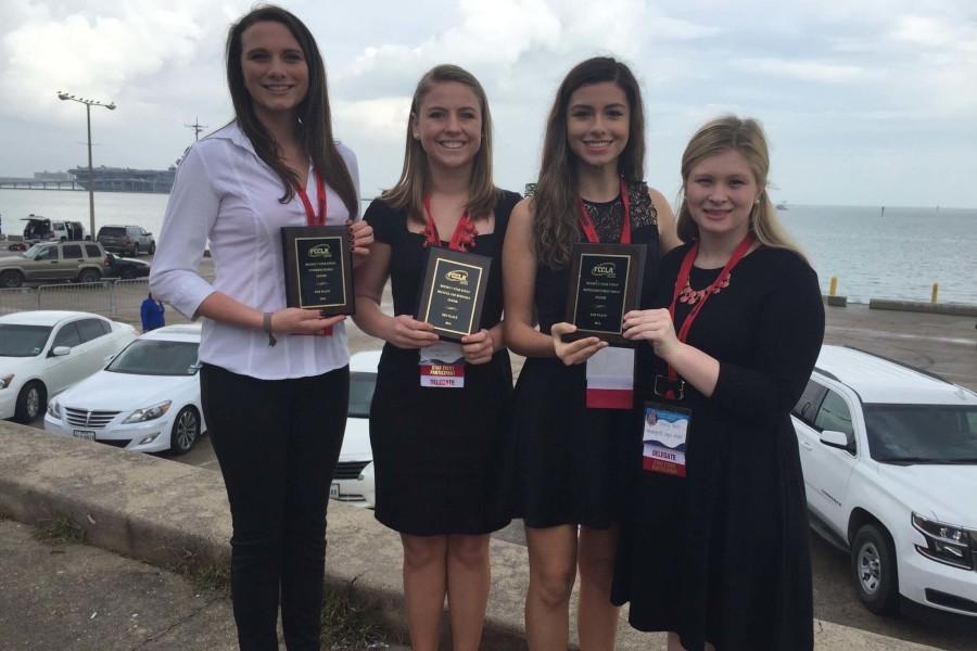 FCCLA members hold their district awards after the STAR competition in Corpus Christi.