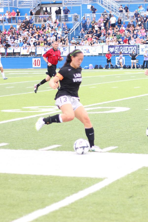 Paige Welch steals the ball from the opposing team in the State semi-finals