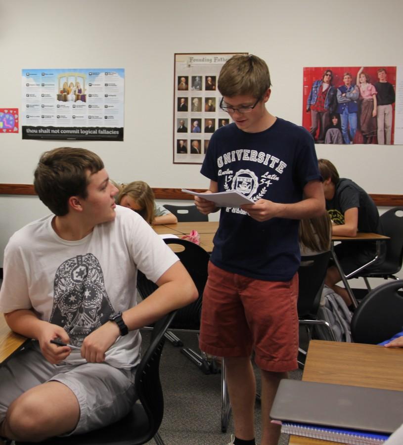 Majority leader of the 4th Period Senate, Trevor Egerton, and Majority Whip, Brendan Hollaway, discuss where to send proposed laws for review,