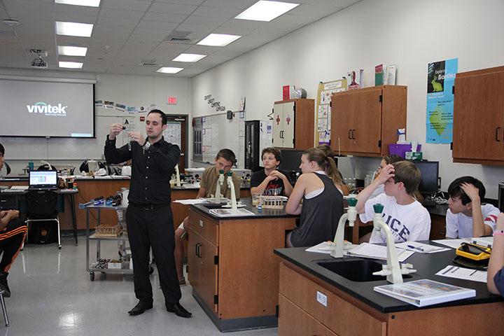 Mr. Schocken demonstrating a lab.