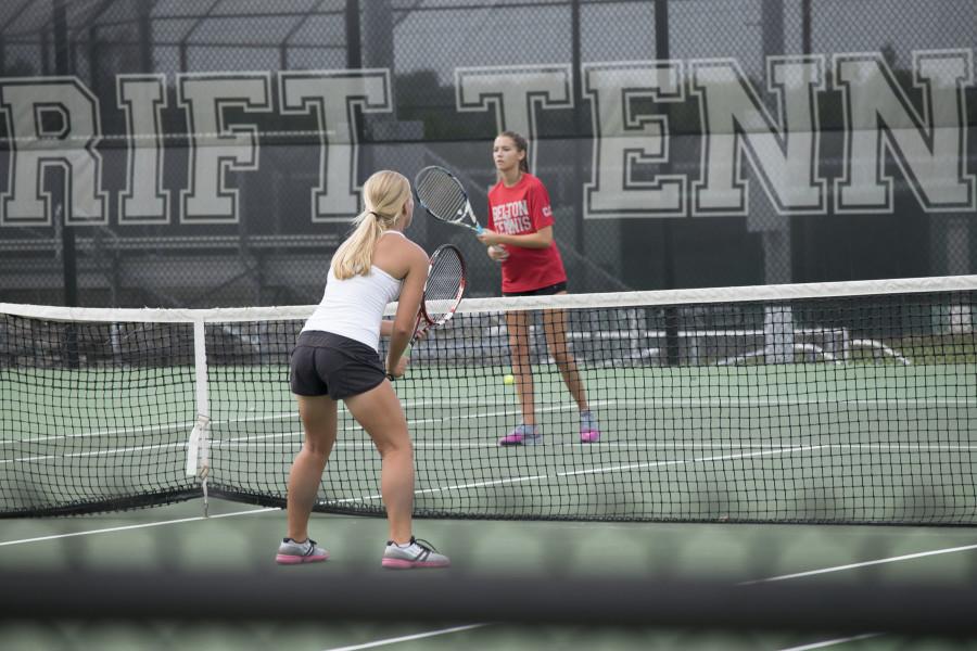 Tennis players practicing for state.