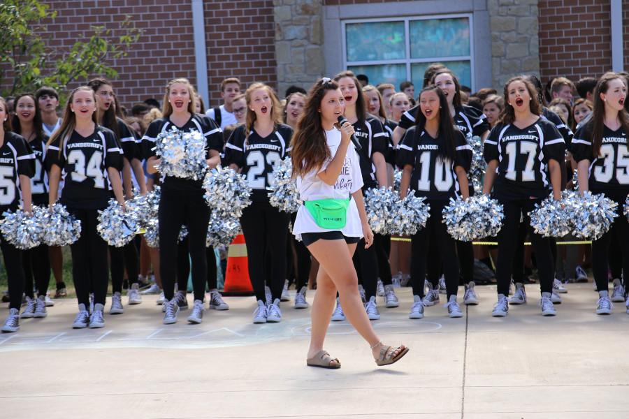 Senior Emma Spasaro leads one of the first pep rallies of the year.