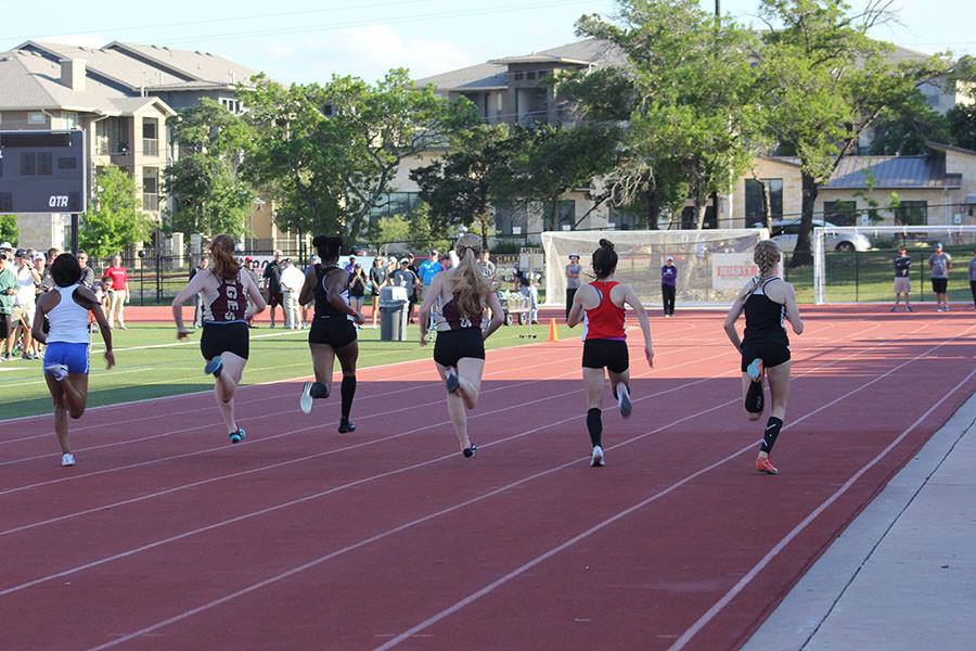 Track competes in preliminaries and finals