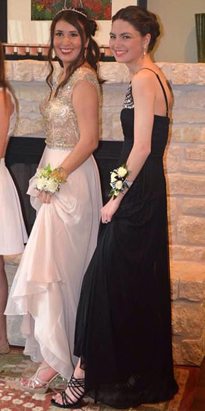 Seniors Emma-Rose Floyd and Jasmine Moreno show off their footwear before heading off to the dance floor.