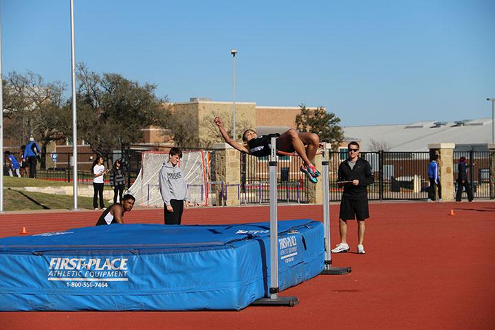 Freshman Kyla Peeples competing in the high jump.