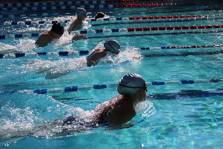 The Viper Swim team competes in the 50 meter breaststroke at the Black and Silver swim meet.