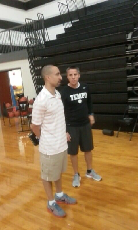 Texas head coach Shaka Smart talks to the Viper basketball team. The Longhorns made an appearance in the NCAA Tournament and won 20 games in his first year at UT.