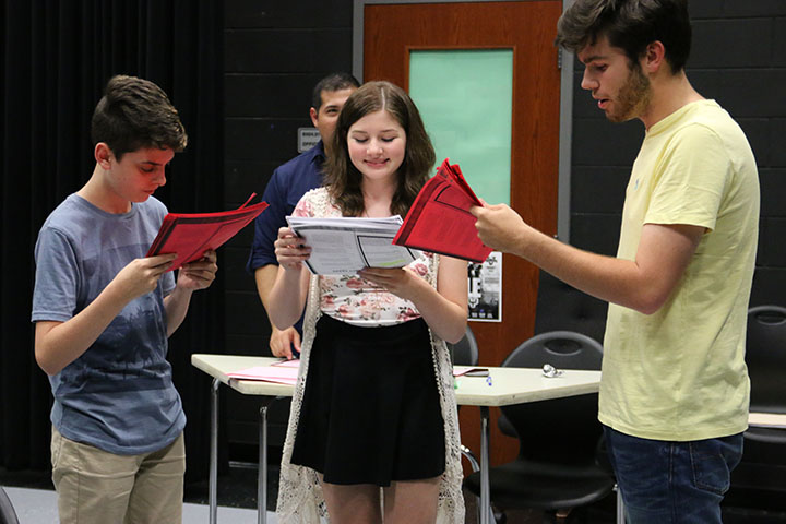 Theater+students+Jack+Smith%2C+Madison+Woodrum%2C+and+Carlos+Alvarez-Roth+practice+their+lines+at+an+after+school+rehearsal+on+Aug.+29.