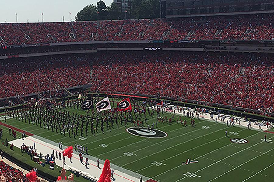 Georgia+football+runs+out+of+the+tunnel+for+their+game+against+Nicholls+State.+They+won+the+game+26-24.+