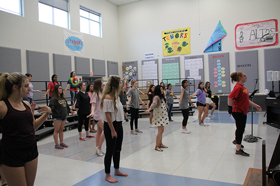 Non-varsity women rehearse their numbers after school.