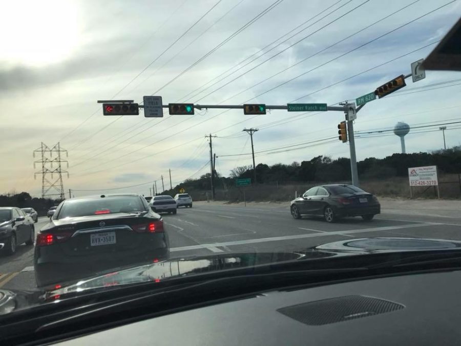 Drivers wait at the now working light. The new light was flashing yellow for a few weeks before it was fully functional the week of March 5. Ricardo Moschella photo