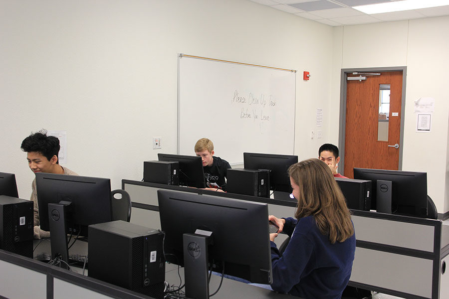 Advanced Chinese students sit in the computer lab during their class.