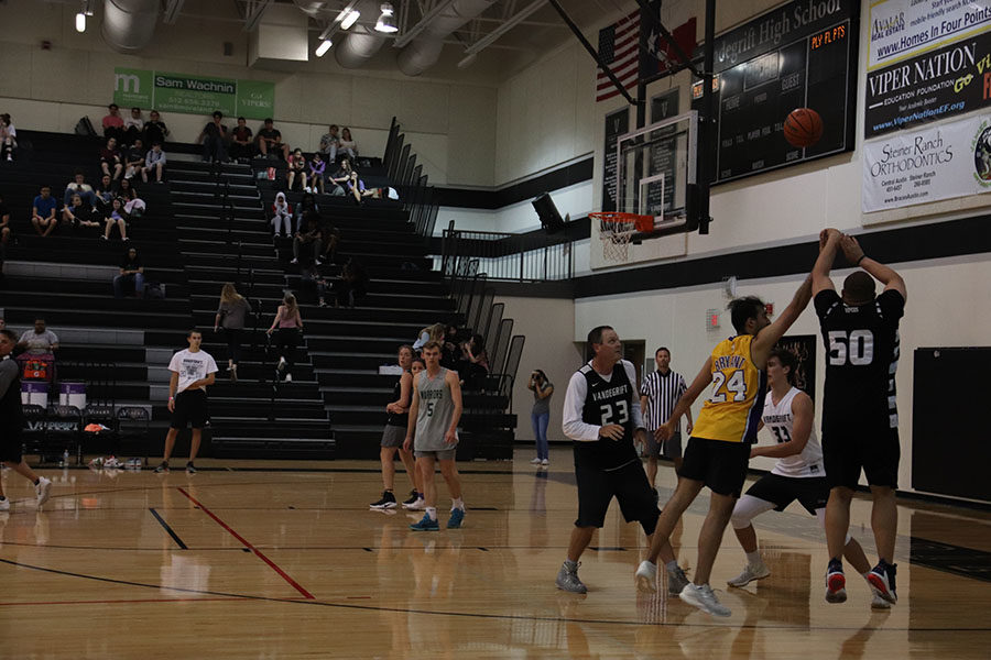 Basketball coaches and students face off