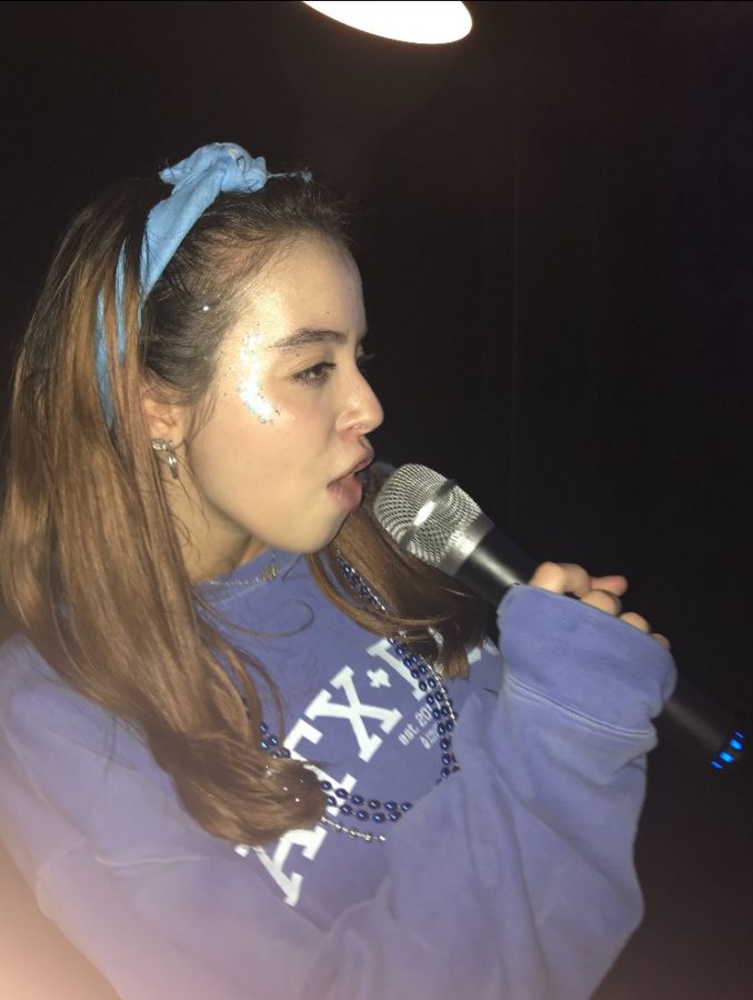 Peleg sings at a karaoke event for Spring MIT Pickup 2018