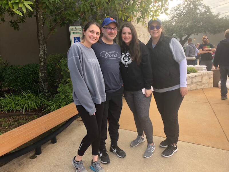 The Pomerantz family stands outside P.F. Changs  on Thanksgiving day while volunteering at Operation Turkey. 