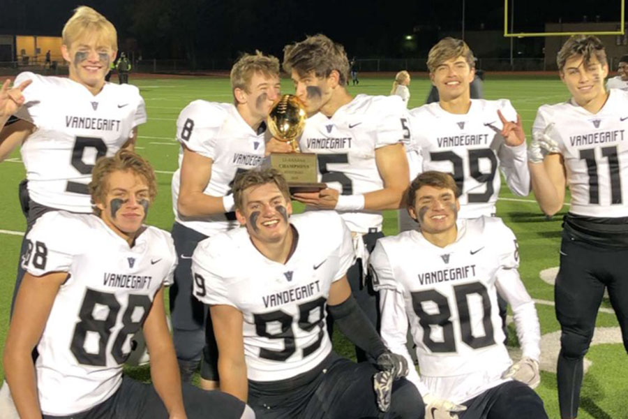 Vipers celebrate the district championship and securing their perfect season after the 28-7 victory over Stony Point.