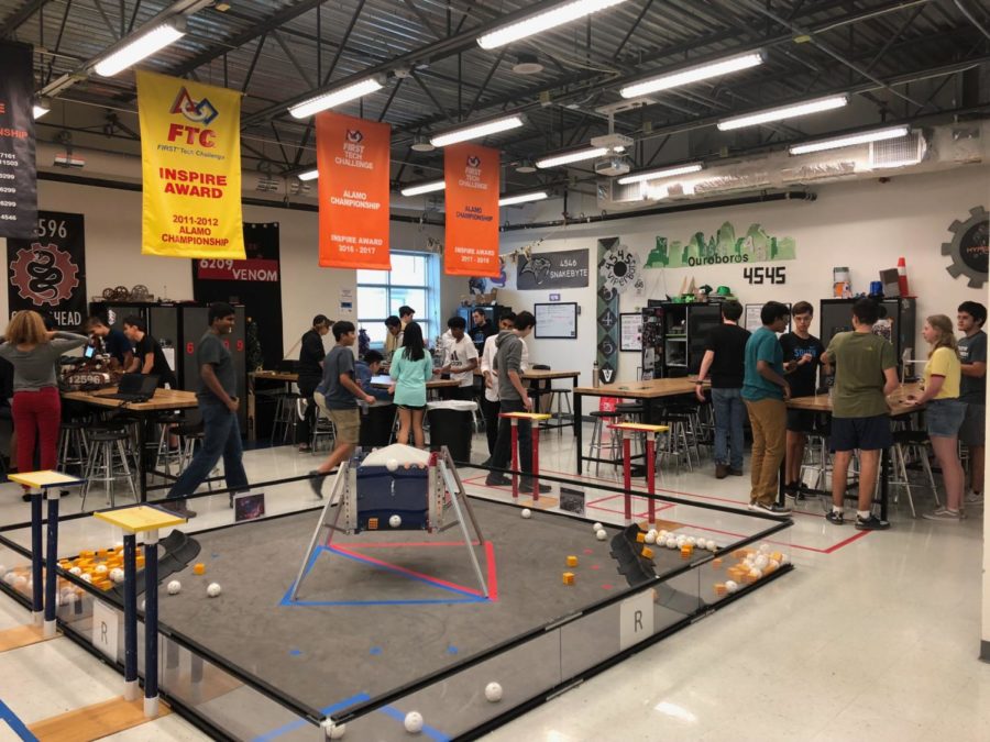 Students make last minute changes to their robots for scrimmages after school on Nov. 8. 