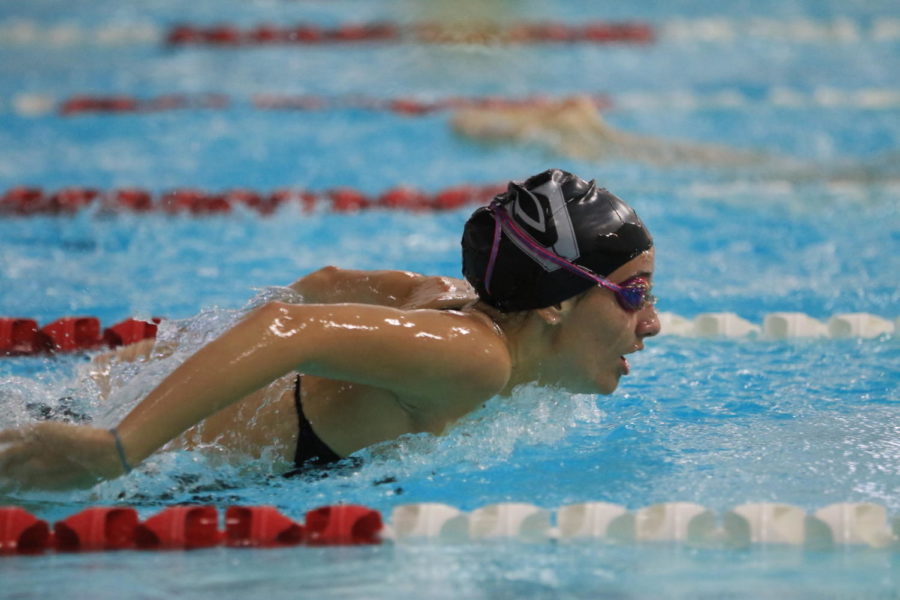 Julia Roberto races across the pool.
