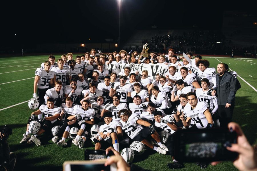 The football team celebrates after a 28-7 win over Stony Point. 