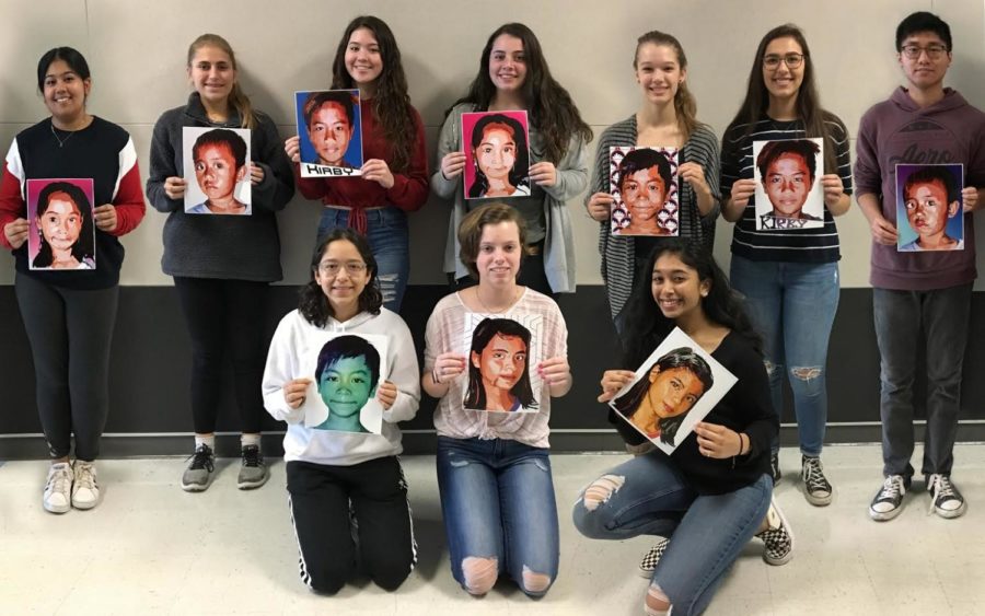 Ten graphic design students display their portraits for the Memory Project