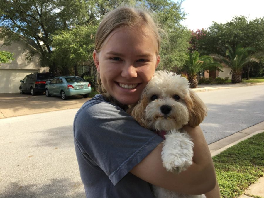 Kiersten with her emotional support dog, Willow.