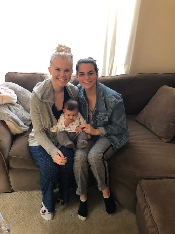 Kiersten and her best friend Piper Swearengin visiting a friends baby.