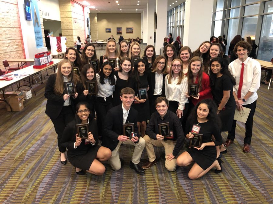 FCCLA+competitors+show+off+their+awards.