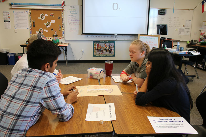 Ms. Wachsmann’s 4th period IB Theory of Knowledge students congregate at their desks. 