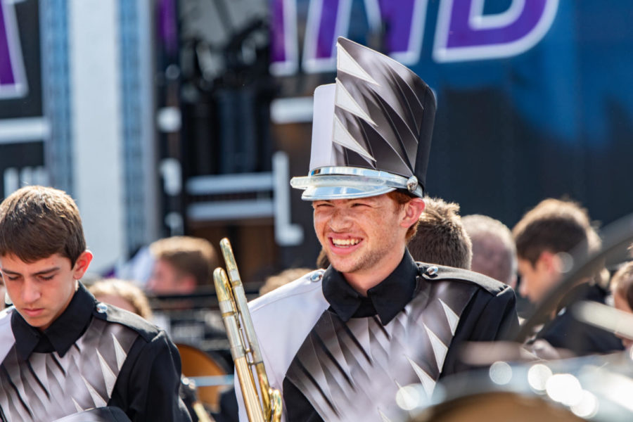 Senior Devin Fink stands with his instrument, the baritone trombone, in a performance with Vandegrift High School Band and Vision Dance Company.  