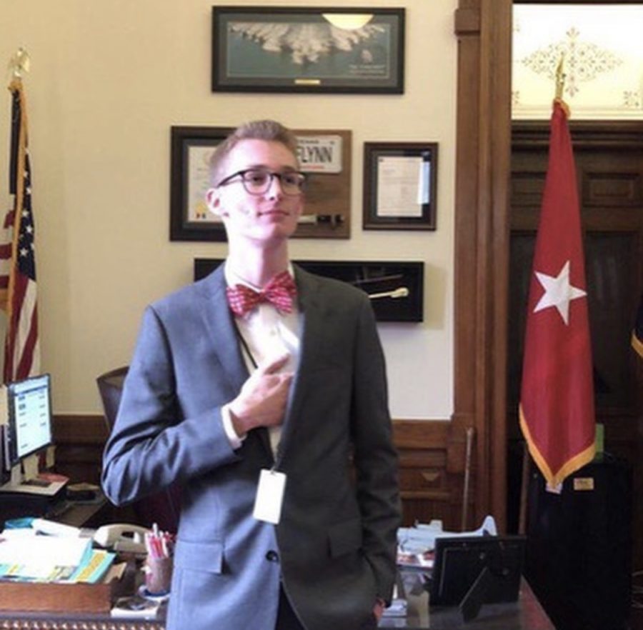 Kyle Legg posing in the House of Representatives. 