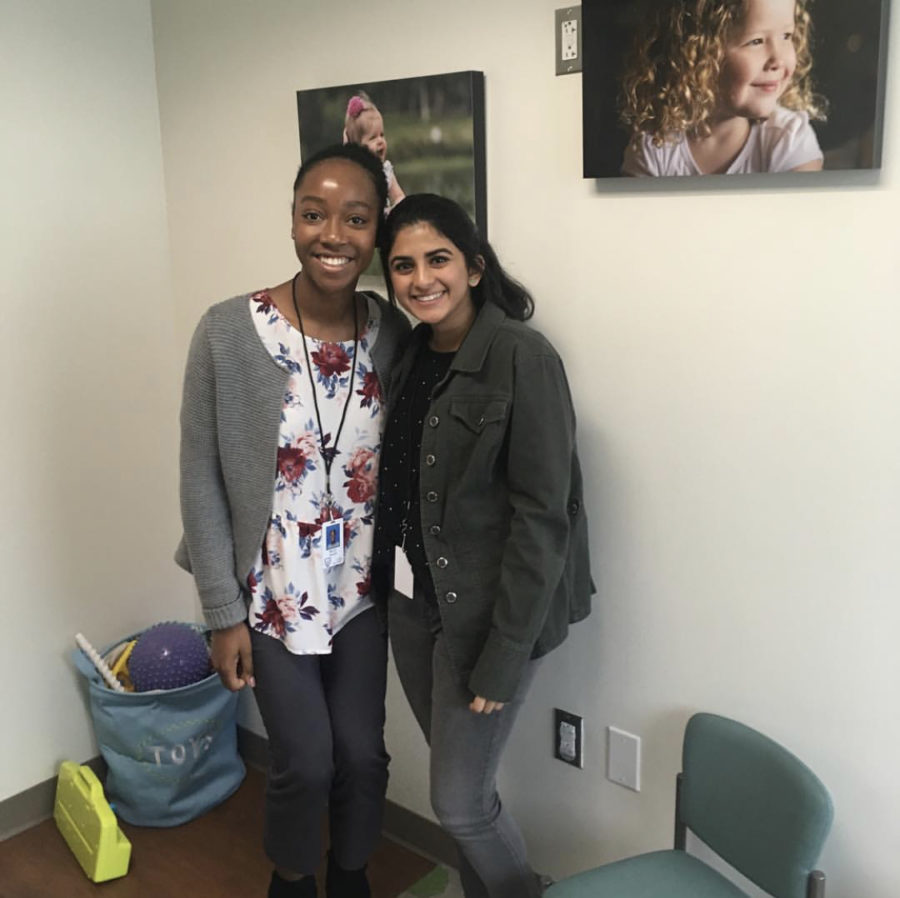 Senior Myrah Sheriff (right) spent cool week at Dell Childrens Hearing center.