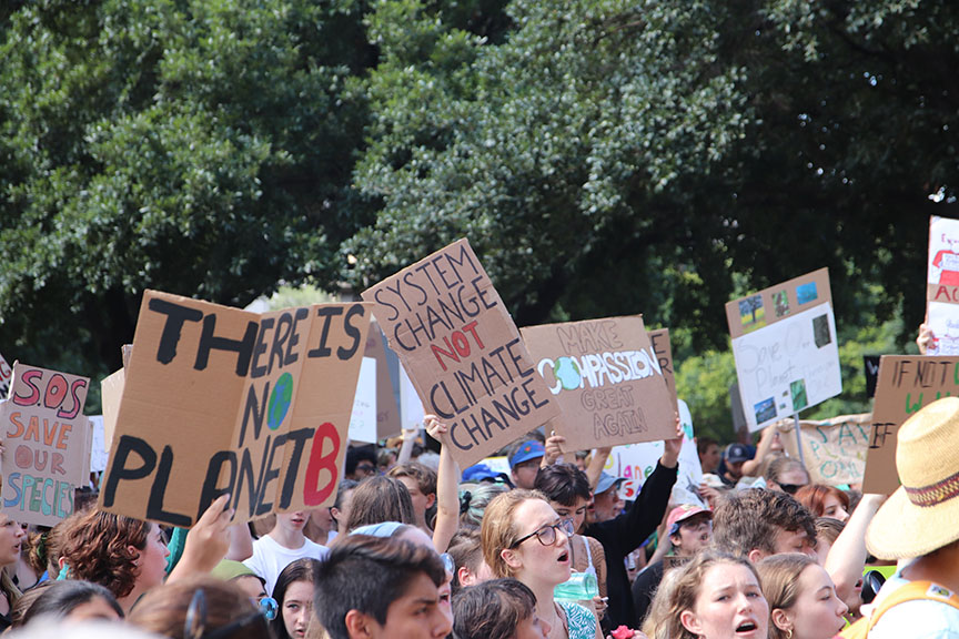 Students gather at the capitol to advocate for measures to protect the earth. 