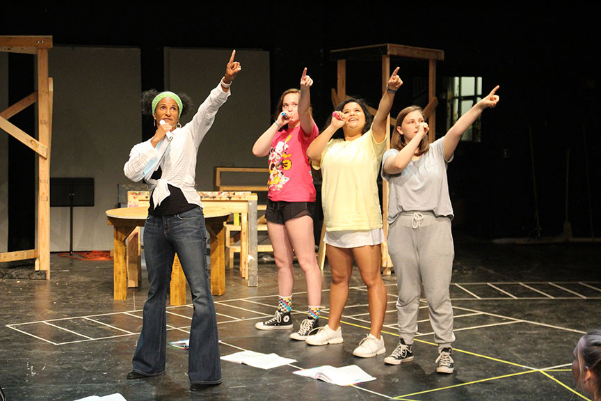 Choreographer Dion Schaffner teaches leads Raine Collier (Tanya) , Izzy Mendoza (Donna Sheridan), and Julia Jones (Rosie) (left to right) the dance to “Super Trouper.” This is Schaffner’s first year choreographing for a VHS Theatre Company musical. 