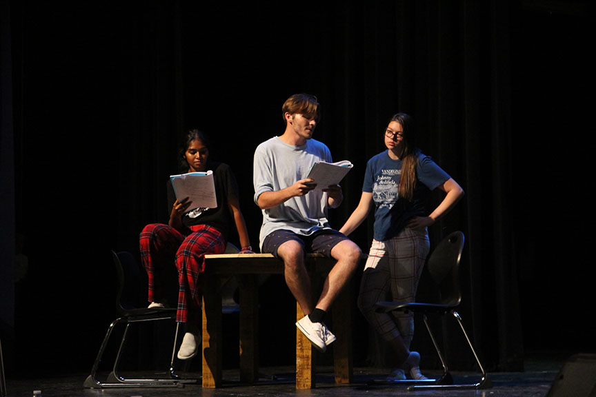 Jeyashri Rameshbabu (Sam Carmichael), Zander Harrison (Harry Bright), Woodrom (Bill Austin) (left to right) sing “Thank You for the Music.” Along with Woodrom, Rameshbabu is also a stage manager, and the two were filling in for the missing parts in the show.