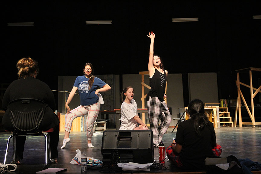 Kelsey Woodrom (Ali), Gilbert and Claire Lawrence (Lisa) (left to right) strike a pose while performing “Honey, Honey.” Woodrom is actually a stage manager and was filling in for Kayla Stewart during the full run through of the show. 