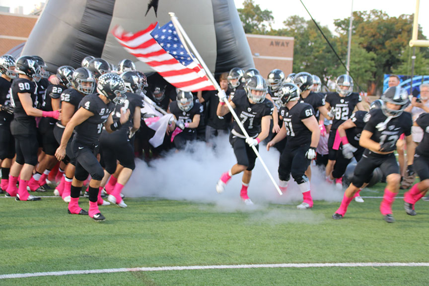 Vipers run out of the tunnel with the American flag before every game as a tradition. It makes me feel very important to the team and is very exciting, senior Brandon Haley said.