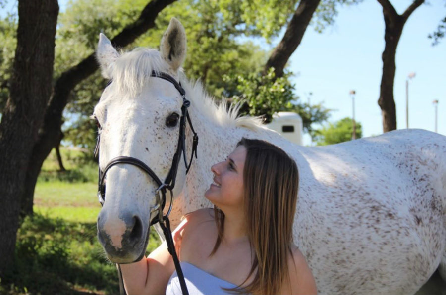 Hollar and Viper pose for a picture at the barn.