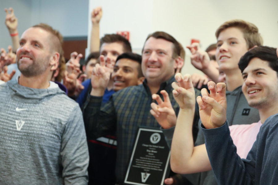 The football team surprised Bruce with the award during PIT on Monday.