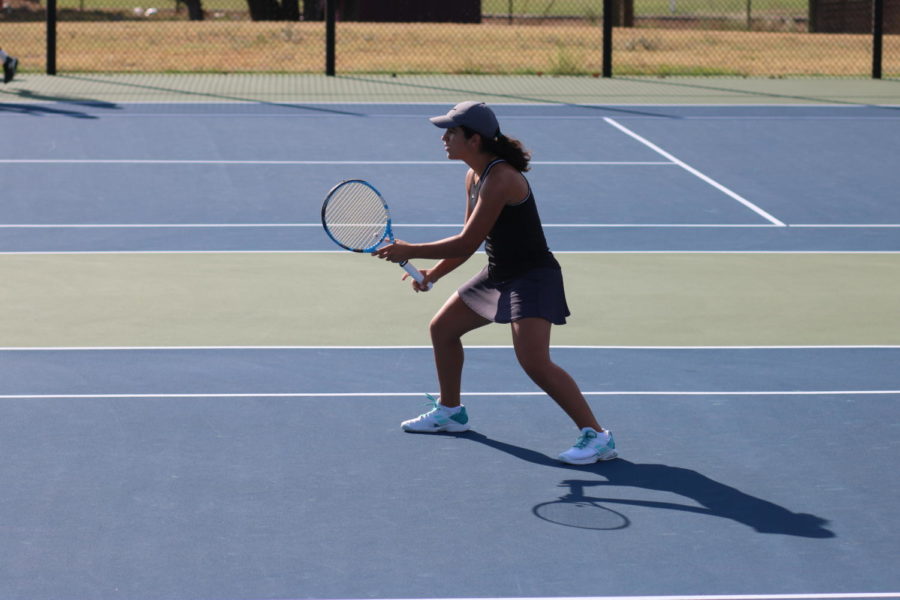 Vandegrift varsity tennis player waits for the serve during the Girls Singles match.