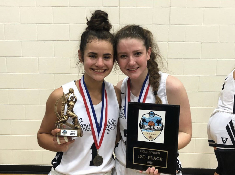 MVPs Kaya Pehrson and Skye Orourke pose with their trophies