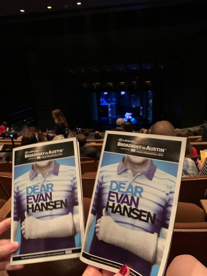 The writer and her best friend held their Dear Evan Hansen playbills in front of the stage before the musical began.